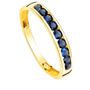 18K SORTIJA ORO AMARILLO 9 CIRCONITAS AZULES. ANCHO CUERPO 3.5 MM